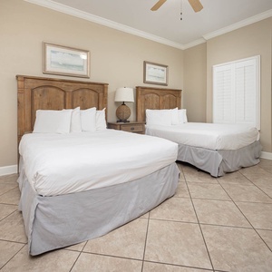 Relax on one of the cozy queen beds in this guest suite and enjoy a peaceful slumber