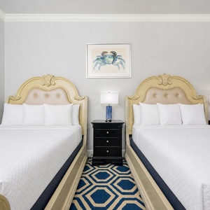 Drift into restful nights on a queen bed, framed by charming decor and ready for family fun and relaxation