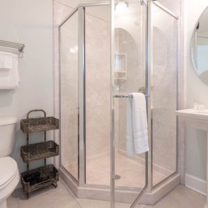 Refresh your morning with a relaxing shower in this guest bath