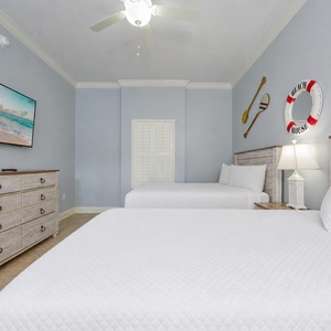 In the guest suite, you'll sink into plush queen beds and enjoy streaming a favorite show on the flat screen TV