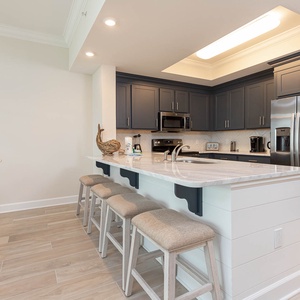 Gather around the breakfast bar for a casual meal or morning coffee