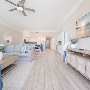 Relax in the family room with soft seating, a stylish coffee table, and a large TV for entertainment