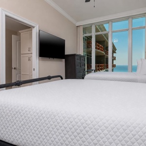 Stream your favorite shows in this guest suite and wake up to stunning views nestled in the double beds