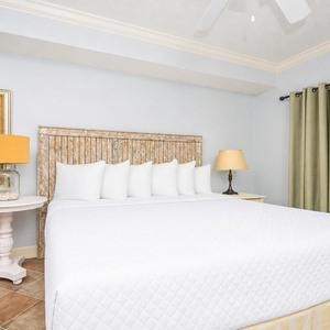Sink into the king bed, enjoying restful nights in a serene space that feels like your own personal retreat
