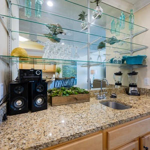 Mix refreshing drinks at the sleek wet bar, enhancing your relaxation with style and convenience