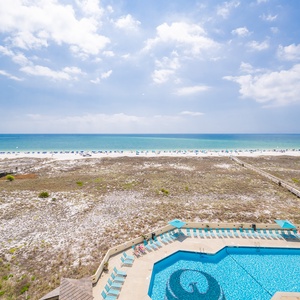 Take in the breathtaking coastal views from your balcony while soaking up the sun and enjoying the gentle breeze