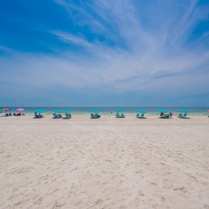 Wake up to stunning views of the Gulf and pristine sandy beach