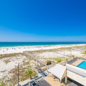 Soak in stunning beach views and warm sunshine from your beachfront balcony