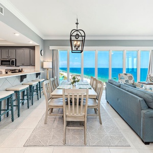 Gather for meals or a fun family game night and take in the beachfront gulf view through tall windows