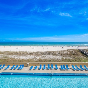 The sparkling pool invites you to lounge under sunny skies while the family enjoys the water