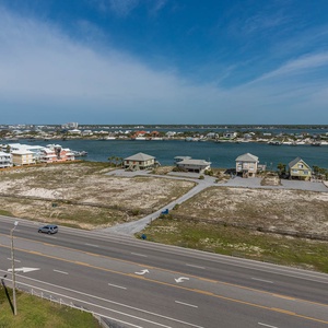 Enjoy scenic views of charming homes and tranquil waters from your elevated vantage point