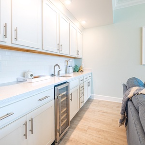 Grab a chilled bottle from the wine cooler or create your favorite cocktail at the wet bar