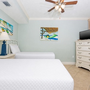 Experience restful nights in this twin guest suite, with refreshing coastal artwork inspiring your dreams