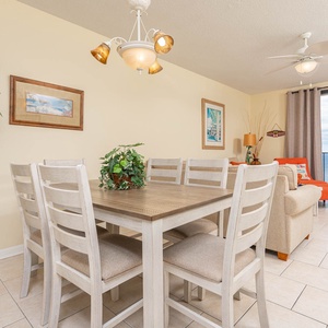 Dine comfortably at the light-filled table, with a view of the beach and vibrant decor enhancing your experience
