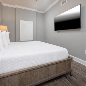 Get cozy in the fluffy king bed in this guest suite and stream your favorite shows