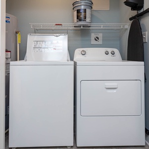 Easily keep your beachwear fresh with the convenient washer and dryer, ready for your next shoreline adventure