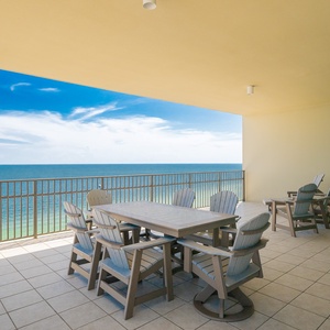 Enjoy morning coffee at your balcony table, embracing the refreshing vibe and breathtaking coastal views