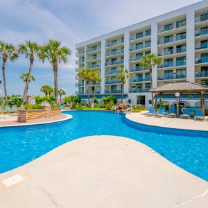 Take in the inviting pool area, perfect for a refreshing swim or relaxing afternoon