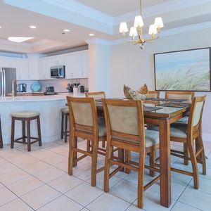 Gather around the spacious dining table, perfect for enjoying meals with family and friends in a welcoming atmosphere