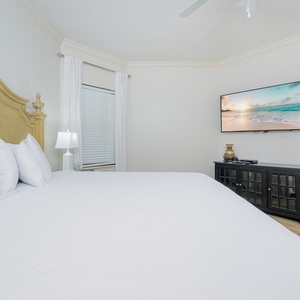 Relax on the cozy king bed in this guest suite and stream your favorite shows after a fun vacation day