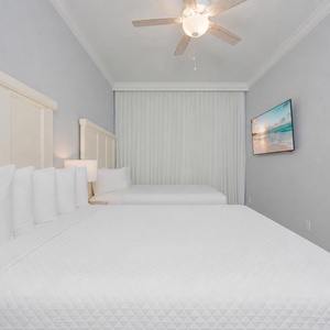 Experience restful nights in this queen guest suite, while a sleek TV sets the perfect backdrop for family movie time