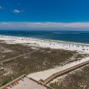 Experience seemingly endless coastline views of the horizon as waves lap the shore and the sun glistens over the water