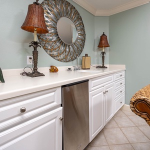 Grab a chilled drink from the fridge or create your favorite cocktail at the wet bar