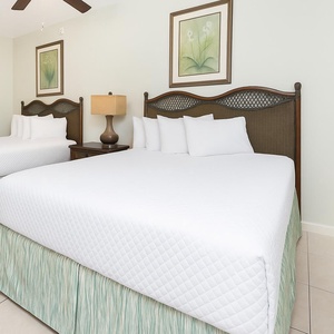 Drift into restful nights in this queen guest suite, while the soothing decor enhances your cozy beach retreat