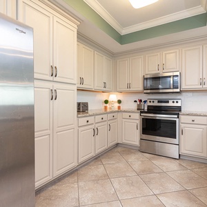 Create delightful meals in this kitchen, where stainless appliances and stylish cabinetry inspire culinary creativity