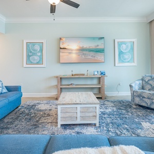 Relax on the cozy sofa with a queen sleeper in this inviting family room with breathtaking beachfront views