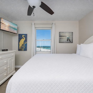 Soft coastal sounds drift through the master suite as you unwind on the king bed and watch a show on TV