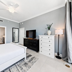 Pull back the curtains by the dresser to listen to waves and watch the gulf from the master suite balcony