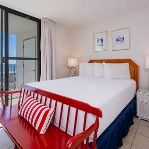 Unwind in the queen master suite, surrounded by soft linens, as beach views invite relaxation and serenity into your retreat