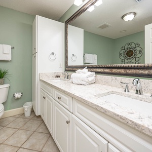 Refresh in the master bath after a day of adventure with a soothing jetted tub and relaxing walk-in shower