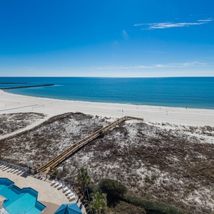 Enjoy breathtaking views of the tranquil waters and shoreline from your balcony