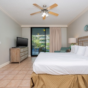 Retreat to the king master suite with cozy bedding and drift off to coastal sights and sounds of the bay