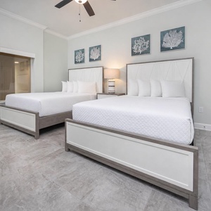 Relax on one of the cozy queen beds in this guest suite and enjoy a peaceful slumber