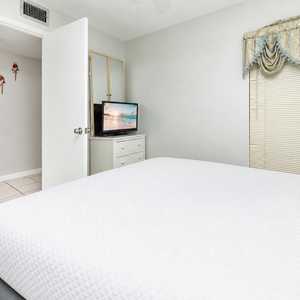 Quiet guest suite with a double bed invites you to unwind while streaming favorites on the TV