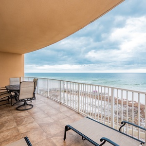 Breathe in the fresh coast air while lounging on the spacious balcony, enjoying stunning views and tranquil sounds