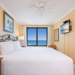 Wake up to stunning coastal views from your king master suite, inviting you to start your day in this serene retreat
