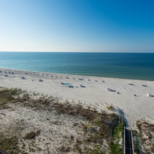 Experience a morning sunrise from the balcony with a cup of coffee to brighten your day from this vacation rental