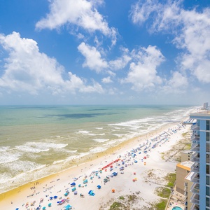 Bask in the sun while enjoying expansive views of the coastline and shimmering waters from your balcony