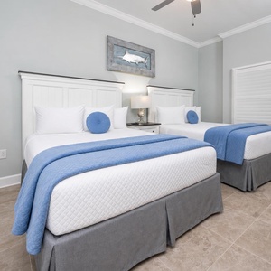 Stretch out on fluffy queen beds, switch on the wall-mounted TV, and cool off under the ceiling fan
