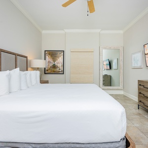 Relax on the cozy king bed in this guest suite and stream your favorite shows after a beach day