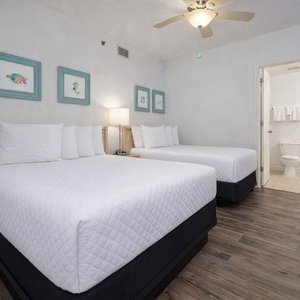 Relax on one of the cozy double beds in this guest suite and enjoy a peaceful slumber