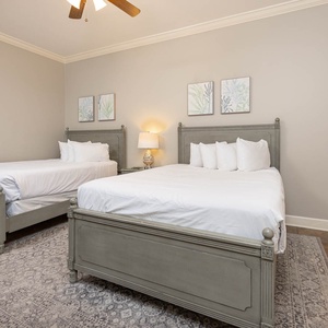 Unwind in this queen guest suite, surrounded by soft linens and peaceful decor, perfect for restful nights