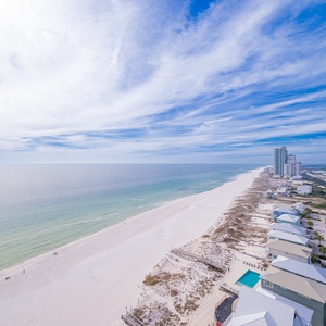 Gaze across the tranquil coast from your balcony, soaking in the soothing views and gentle sounds of nature