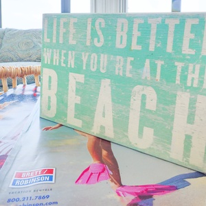 Discover a cheerful atmosphere with beach-themed decor and inviting seating, perfect for relaxing and enjoying your stay