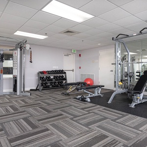 Stay fit in our well-equipped gym featuring weights and machines for a refreshing workout during your stay at Seawind