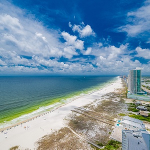 Embrace the serene coastal views from your beachfront balcony, letting the relaxing sounds of the waves wash over you